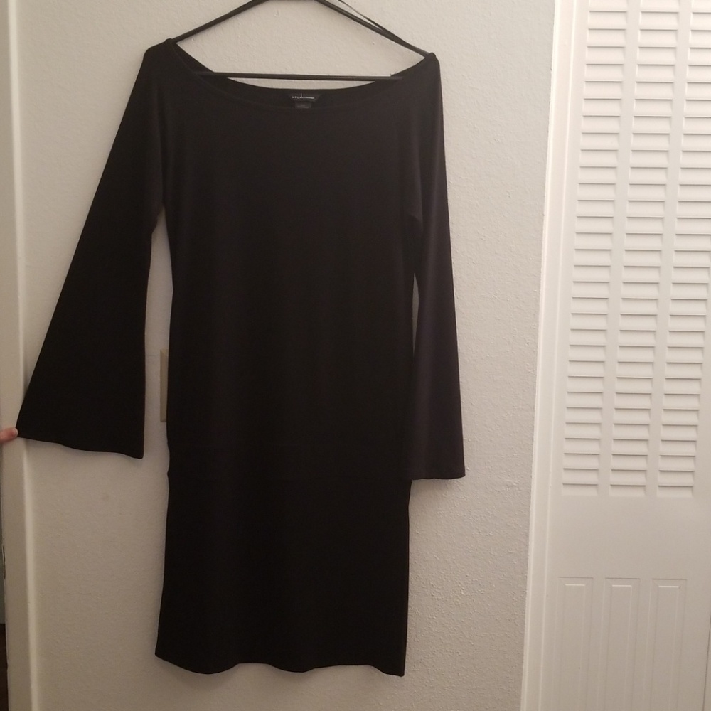 Long sleeve black dress with flared arms